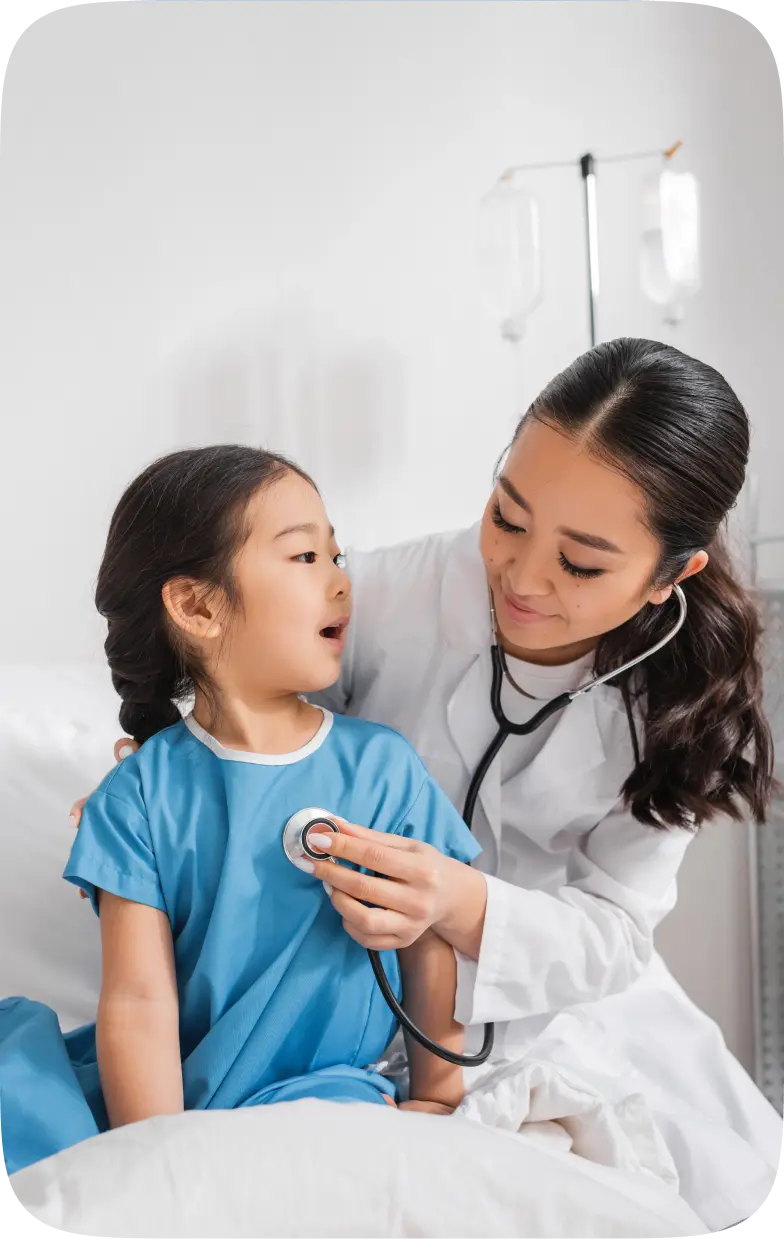 A doctor doing a medical check up on the female toddler.